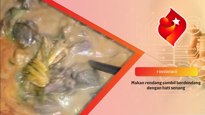 Makan rendang sambil berdendang dengan hati senang